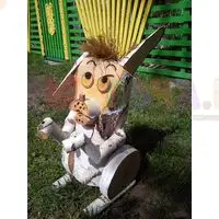 Деревянные фигуры в искусстве украшения садового участка