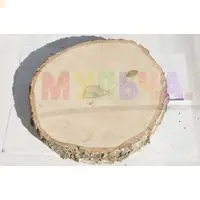 Аккуратно отпиленные и тщательно отшлифованные березовые спилы